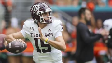 Sep 9, 2023; Miami Gardens, Florida, USA; Texas A&M Aggies quarterback Conner Weigman (15) throws the football during warmups prior to the game against the Miami Hurricanes at Hard Rock Stadium. 