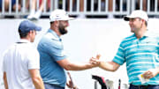 PGA Tour players Rory McIlroy, Jon Rahm and Scottie Scheffler greet each other before teeing off on the first hole during the second round of the FedEx St. Jude Championship at TPC Southwind in Memphis, Tenn., on Friday, August 11, 2023.