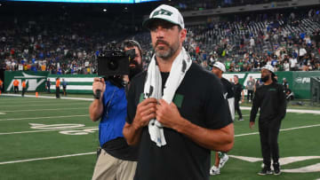 Aug 24, 2024; East Rutherford, New Jersey, USA; New York Jets quarterback Aaron Rodgers (8) walks on the field following the game against the New York Giants at MetLife Stadium.