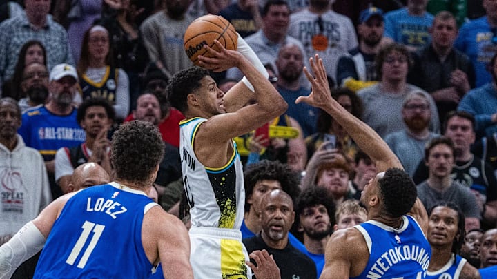 Mar 11, 2025; Indianapolis, Indiana, USA; Indiana Pacers guard Tyrese Haliburton (0) shoots the ball and scores tying 3 point basket while getting fouled by Milwaukee Bucks forward Giannis Antetokounmpo (34) in the second half at Gainbridge Fieldhouse. Mandatory Credit: Trevor Ruszkowski-Imagn Images Mar 11, 2025; Indianapolis, Indiana, USA; Indiana Pacers guard Tyrese Haliburton (0) shoots the ball and scores tying 3 point basket while getting fouled by Milwaukee Bucks forward Giannis Antetokounmpo (34) in the second half at Gainbridge Fieldhouse. Mandatory Credit: Trevor Ruszkowski-Imagn Images