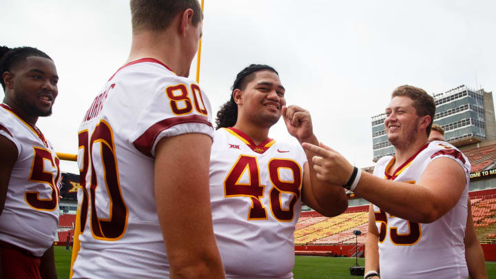 Iowa State football players, Eyioma Uwazurike, far left, Vince Horras, Kamilo Tongamoa, and Tucker Robertson, far right, joke around during media day on Tuesday, Aug. 7, 2018 in Ames.

0807 Isumediaday 19 Jpg