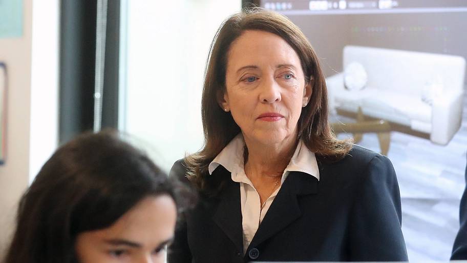 U.S. Sen. Maria Cantwell (D-WA) looks on a as students in a 3-D animation class work on projects.