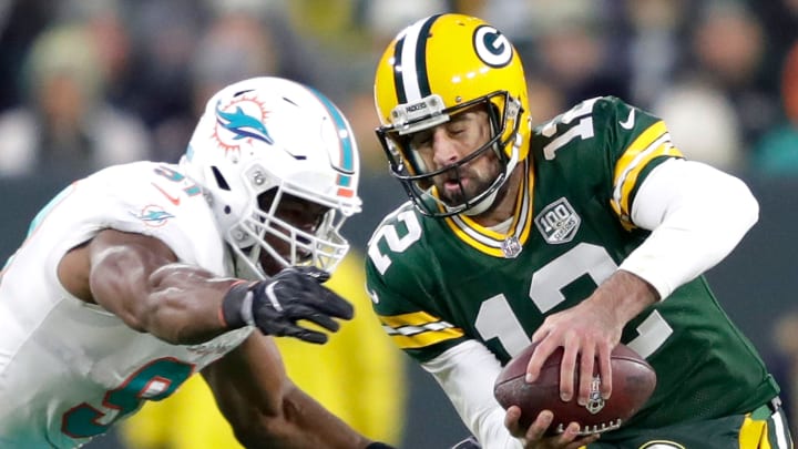 Miami Dolphins defensive end Cameron Wake sacked Aaron Rogers in Green Bay during a 2018 game after getting to him three times at Lambeau Field eight years earlier.