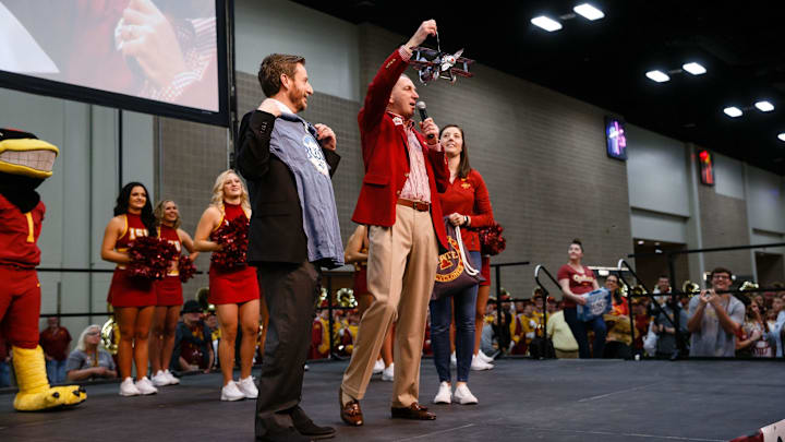 Iowa State Athletic Director Jamie Pollard hands Valero Alamo Bowl CEO Derrick Fox a plane made out of Busch Light cans during the Cyclone Spirit Rally on Thursday, Dec. 27, 2018, in San Antonio. Iowa State takes on Washington State in the Valero Alamo Bowl on Friday. Iowa State Athletic Director Jamie Pollard hands Valero Alamo Bowl CEO Derrick Fox a plane made out of Busch Light cans during the Cyclone Spirit Rally on Thursday, Dec. 27, 2018, in San Antonio. Iowa State takes on Washington State in the Valero Alamo Bowl on Friday.