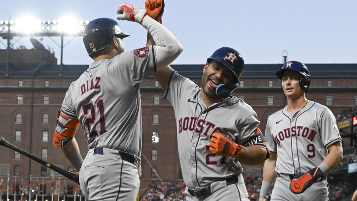 Aug 23, 2024; Baltimore, Maryland, USA; Houston Astros second baseman Jose Altuve (27) celebrates with catcher Yainer Diaz (21) after hitting a two run home run against the Baltimore Orioles  at Oriole Park at Camden Yards. Mandatory Credit: Tommy Gilligan-USA TODAY Sports