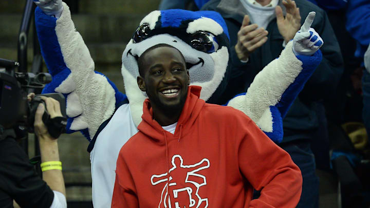 Dec 9, 2016; Omaha, NE, USA;  Light welterweight boxing champion Terence Crawford acknowledges the crowd during a break in the game between the Creighton Bluejays and the Longwood Lancers at CenturyLink Center Omaha. Creighton defeated Longwood 113-58. Mandatory Credit: Steven Branscombe-Imagn Images