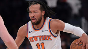 Oct 17, 2025; New York, New York, USA; New York Knicks guard Jalen Brunson (11) dribbles against Charlotte Hornets guard/forward Kon Knueppel (7) during the second half at Madison Square Garden. Mandatory Credit: Vincent Carchietta-Imagn Images