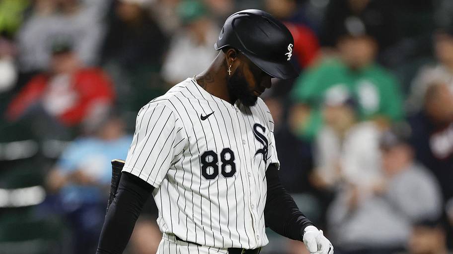 Chicago White Sox outfielder Luis Robert Jr. returns to the dugout after striking out