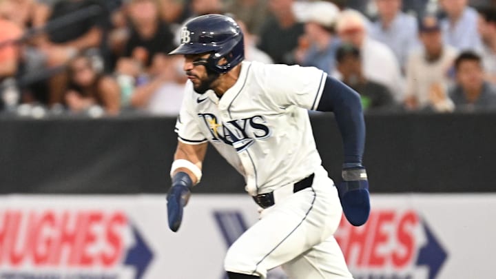 Tampa Bay Rays shortstop Jose Caballero (77) attempts to steal second base in the third inning against the Baltimore Orioles at George M. Steinbrenner Field. Tampa Bay Rays shortstop Jose Caballero (77) attempts to steal second base in the third inning against the Baltimore Orioles at George M. Steinbrenner Field.