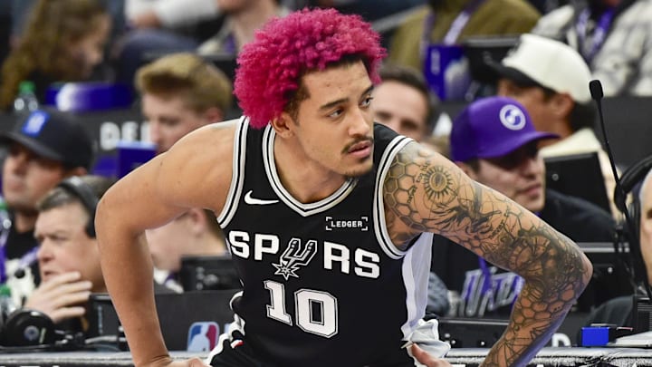 Jan 22, 2026; Salt Lake City, Utah, USA; San Antonio Spurs forward Jeremy Sochan (10) stretches before substituting in during the second half against the Utah Jazz at Delta Center. Mandatory Credit: Peter Creveling-Imagn Images