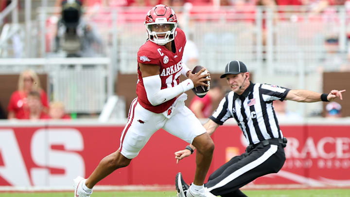 Aug 30, 2025; Fayetteville, Arkansas, USA; Arkansas Razorbacks quarterback Taylen Green (10) rushes int he first quarter against the Alabama A&M Bulldogs at Donald W. Reynolds Razorback Stadium. Mandatory Credit: Nelson Chenault-Imagn Images