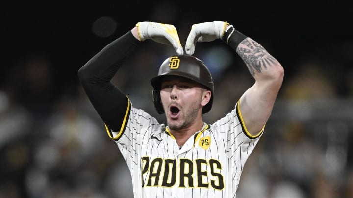 Aug 19, 2024; San Diego, California, USA; San Diego Padres center fielder Jackson Merrill (3) celebrates after hitting an RBI double during the third inning against the Minnesota Twins at Petco Park.