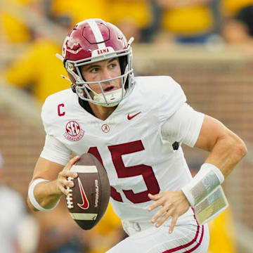 Oct 11, 2025; Columbia, Missouri, USA; Alabama Crimson Tide quarterback Ty Simpson (15) rolls out to pass during the second half against the Missouri Tigers at Faurot Field at Memorial Stadium. Mandatory Credit: Jay Biggerstaff-Imagn Images