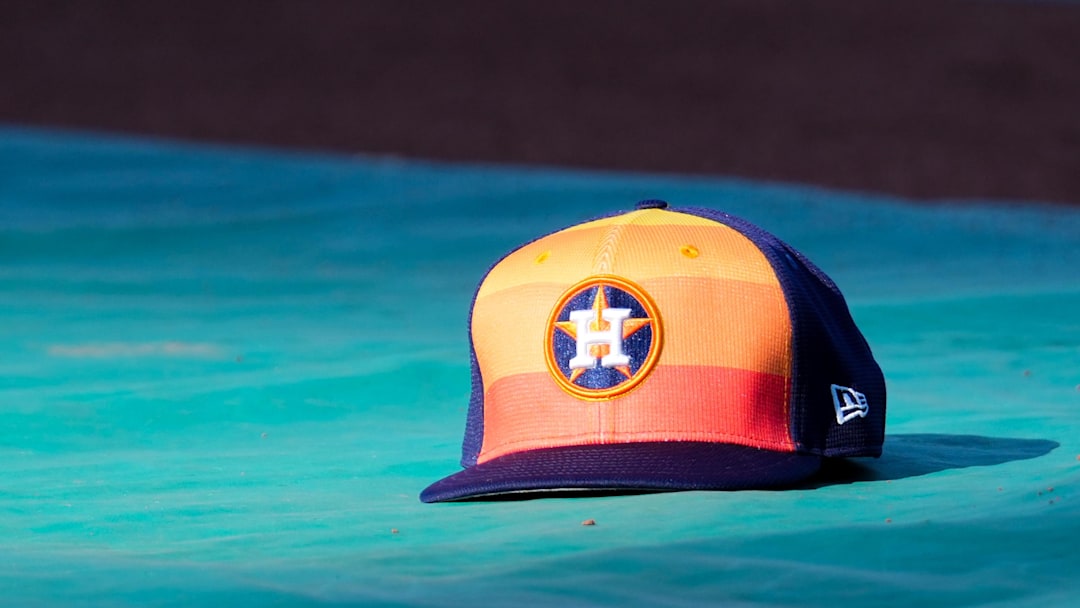 Apr 9, 2024; Kansas City, Missouri, USA; A general view of Houston Astros second base Jose Altuve (27) hat on the field during batting practice prior to a game against the Kansas City Royals at Kauffman Stadium. 
