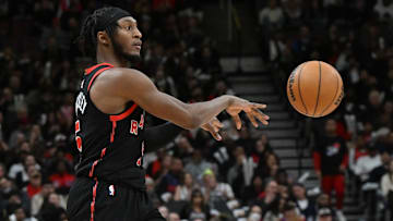 Apr 4, 2025; Toronto, Ontario, CAN;  Toronto Raptors guard Immanuel Quickley (5) passes the ball against the Detroit Pistons in the second half at Scotiabank Arena. Mandatory Credit: Dan Hamilton-Imagn Images