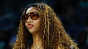 Chicago Sky forward Angel Reese stands on the sidelines before a WNBA game against the New York Liberty.