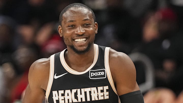 Feb 26, 2026; Atlanta, Georgia, USA; Atlanta Hawks forward Jonathan Kuminga (0) reacts after making a three point shot against the Washington Wizards during the first half at State Farm Arena. Mandatory Credit: Dale Zanine-Imagn Images