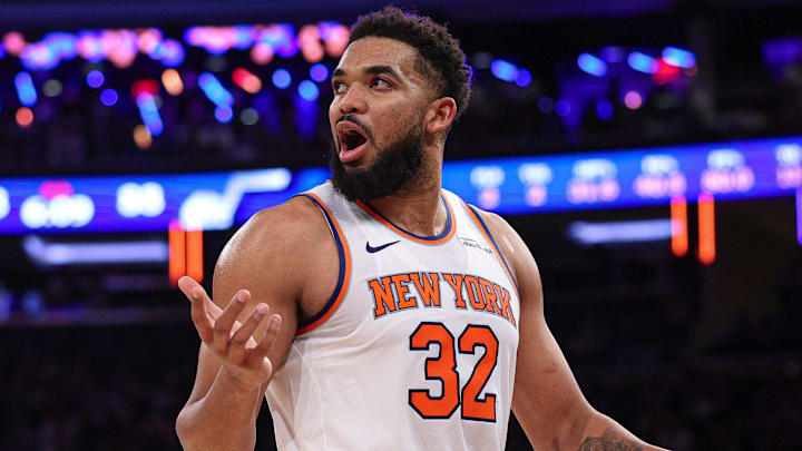 Jan 1, 2025; New York, New York, USA; New York Knicks center Karl-Anthony Towns (32) reacts during the second half against the Utah Jazz at Madison Square Garden. Mandatory Credit: Vincent Carchietta-Imagn Images
