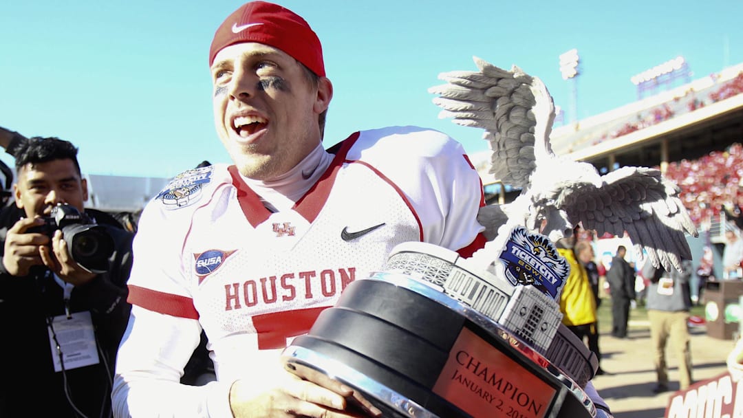 Jan 2, 2012; Dallas, TX, USA; Houston Cougars quarterback Case Keenum (7) celebrates the victory over the Penn State Nittany Lions in the 2012 Ticket City Bowl at Cotton Bowl Stadium.  Mandatory Credit: Kevin Jairaj-Imagn Images