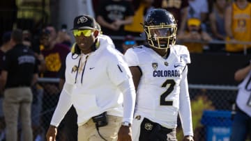Oct 7, 2023; Tempe, Arizona, USA; Colorado Buffaloes head coach Deion Sanders with son and