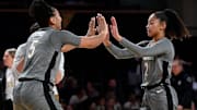 Vanderbilt’s Leilani Kapinus (5) congratulates Jada Brown (2) after their 94-40 win against Appalachian State in an NCAA college basketball game Sunday, Dec. 1, 2024, in Nashville, Tenn.