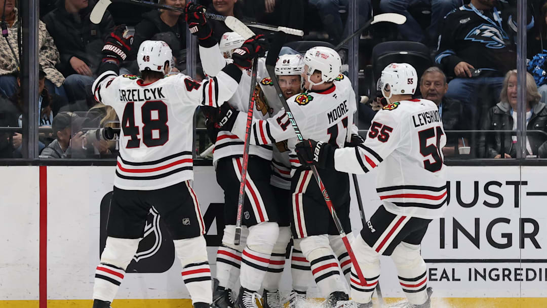 Mar 1, 2026; Salt Lake City, Utah, USA; The Chicago Blackhawks celebrate a goal by left wing Landon Slaggert (84) against the Utah Mammoth during the second period at Delta Center. Mandatory Credit: Rob Gray-Imagn Images