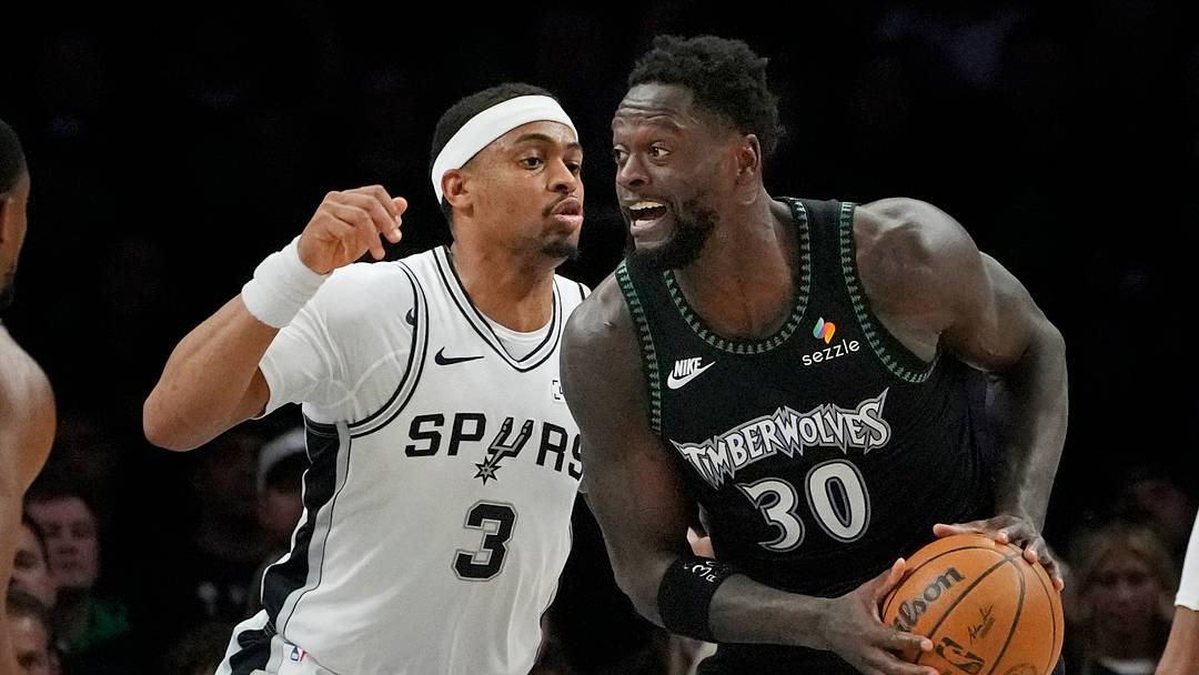 May 10, 2026; Minneapolis, Minnesota, USA; Minnesota Timberwolves forward Julius Randle (30) works around San Antonio Spurs forward Keldon Johnson (3) in the first quarter of game four of the second round of the 2026 NBA Playoffs at Target Center. Mandatory Credit: Bruce Kluckhohn-Imagn Images