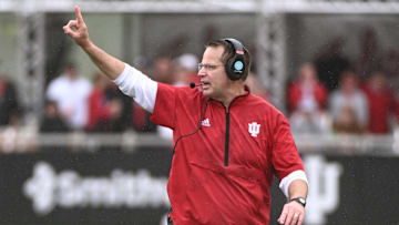 Sep 28, 2024; Bloomington, Indiana, USA;  Indiana Hoosiers head coach Curt Cignetti signals to his team during the second half against the Maryland Terrapins at Memorial Stadium. Mandatory Credit: Robert Goddin-Imagn Images