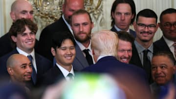 [US, Mexico & Canada customers only] April 7, 2025; Washington, D.C., USA; President Donald Trump speaks with Los Angeles Dodgers designated hitter Shohei Ohtani during a ceremony honoring the members of the 2024 World Series Champion Los Angeles Dodgers in the East Room at the White House. Mandatory Credit: Leah Millis/Reuters via Imagn Images