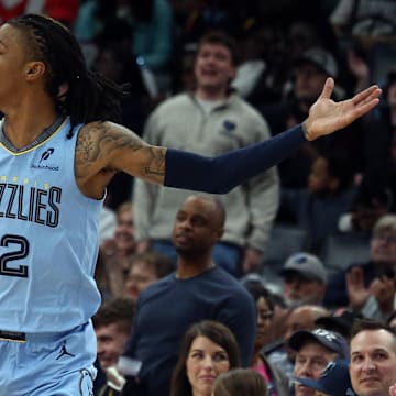 Mar 10, 2025; Memphis, Tennessee, USA; Memphis Grizzlies guard Ja Morant (12) reacts during the third quarter against the Phoenix Suns at FedExForum. Mandatory Credit: Petre Thomas-Imagn Images