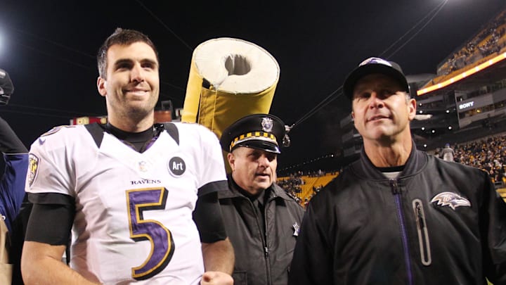 November 18, 2012; Pittsburgh, PA, USA; Baltimore Ravens head coach John Harbaugh (right) and quarterback Joe Flacco (5) react while leaving the field after defeating the Pittsburgh Steelers at Heinz Field. The Baltimore Ravens won 13-10. Mandatory Credit: Charles LeClaire-Imagn Images November 18, 2012; Pittsburgh, PA, USA; Baltimore Ravens head coach John Harbaugh (right) and quarterback Joe Flacco (5) react while leaving the field after defeating the Pittsburgh Steelers at Heinz Field. The Baltimore Ravens won 13-10. Mandatory Credit: Charles LeClaire-Imagn Images