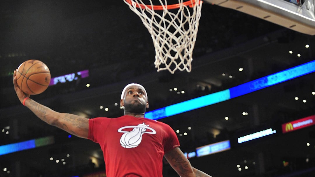 December 25, 2013; Los Angeles, CA, USA; Miami Heat small forward LeBron James (6) dunks to score  a basket against the Los Angeles Lakers during the first half at Staples Center. Mandatory Credit: Gary A. Vasquez-Imagn Images
