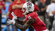 Sep 7, 2024; Charlotte, North Carolina, USA;  North Carolina State Wolfpack tight end Justin Joly (15) during pregame activities against the Tennessee Volunteers at the Dukes Mayo Classic at Bank of America Stadium. Mandatory Credit: Jim Dedmon-Imagn Images