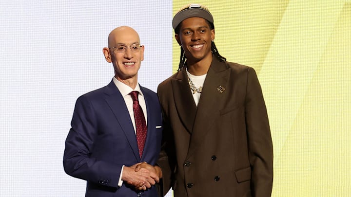 Jun 26, 2024; Brooklyn, NY, USA; Cody Williams poses for photos with NBA commissioner Adam Silver after being selected in the first round by the Utah Jazz in the 2024 NBA Draft at Barclays Center. Mandatory Credit: Brad Penner-Imagn Images