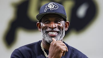 Apr 4, 2025; Boulder, CO, USA; Colorado Buffaloes head coach Deion Sanders watches as his players go through drills at the University of Colorado NFL Showcase at the CU Indoor Practice Facility. Mandatory Credit: Michael Ciaglo-Imagn Images