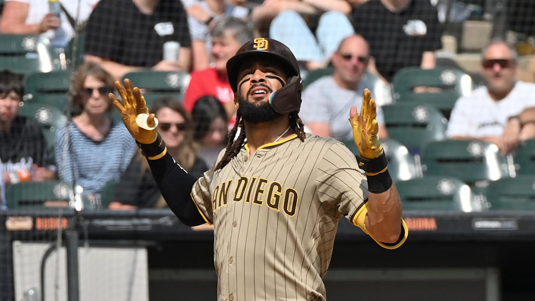 Sep 21, 2025; Chicago, Illinois, USA; San Diego Padres right fielder Fernando Tatis Jr. (23) celebrates his solo home run against the Chicago White Sox during the third inning at Rate Field. 