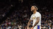 Dec 21, 2024; Sacramento, California, USA; Los Angeles Lakers guard D'Angelo Russell (1) flexes after scoring against the Sacramento Kings during the fourth quarter at Golden 1 Center. Mandatory Credit: Ed Szczepanski-Imagn Images