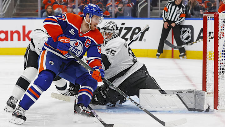 May 1, 2025; Edmonton, Alberta, CAN;Los Angeles Kings goaltender Darcy Kuemper (35) makes a save on Edmonton Oilers forward Connor McDavid (97) during the third period in game six of the first round of the 2025 Stanley Cup Playoffs at Rogers Place. Mandatory Credit: Perry Nelson-Imagn Images