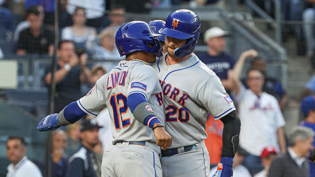 Jul 25, 2023; Bronx, New York, USA; New York Mets first baseman Pete Alonso (20) celebrates his three run home run with shortstop Francisco Lindor (12) and second baseman Jeff McNeil (1) during the third inning against the New York Yankees at Yankee Stadium. Jul 25, 2023; Bronx, New York, USA; New York Mets first baseman Pete Alonso (20) celebrates his three run home run with shortstop Francisco Lindor (12) and second baseman Jeff McNeil (1) during the third inning against the New York Yankees at Yankee Stadium.