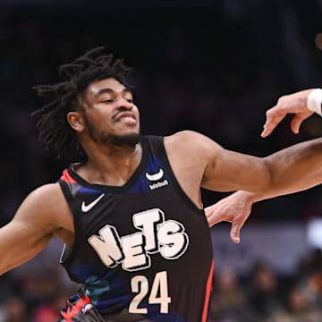 Mar 27, 2024; Washington, District of Columbia, USA;  Brooklyn Nets guard Cam Thomas (24) makes a move to the basket as Washington Wizards forward Corey Kispert (24) defends during the first half at Capital One Arena. Mandatory Credit: Tommy Gilligan-Imagn Images