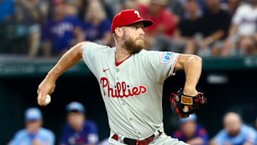 Aug 10, 2025; Arlington, Texas, USA;  Philadelphia Phillies starting pitcher Zack Wheeler (45) throws during the first inning against the Texas Rangers at Globe Life Field.