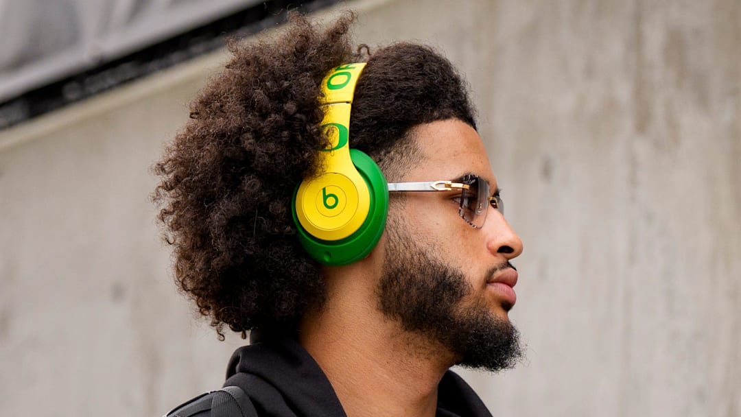 Oregon Ducks Washington Huskies dante moore malik benson uniforms husky stadium dan lanning NIL jedd fisch Atticus Sappington