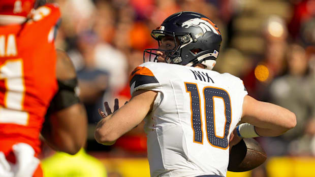 Denver Broncos quarterback Bo Nix (10) throws a pass during the first half against the Kansas City Chiefs at GEHA Field 