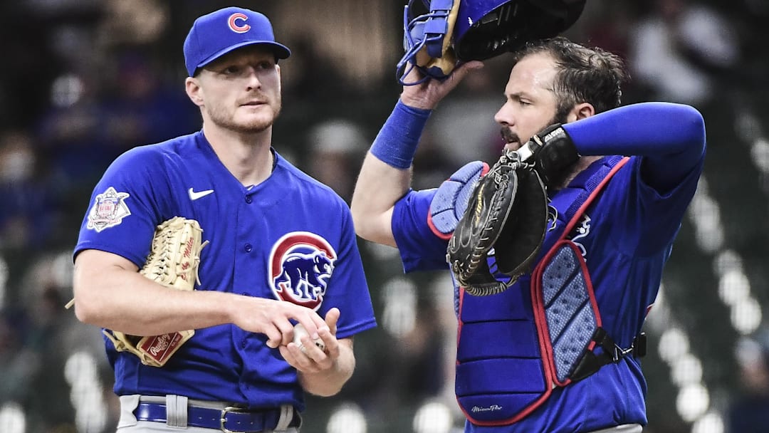 Apr 14, 2021; Milwaukee, Wisconsin, USA; Chicago Cubs pitcher Shelby Miller (29) talks to catcher Austin Romine (25) in the sixth inning during the game against the Milwaukee Brewers at American Family Field. Mandatory Credit: Benny Sieu-Imagn Images
