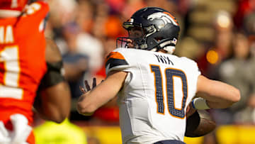 Nov 10, 2024; Kansas City, Missouri, USA; Denver Broncos quarterback Bo Nix (10) throws a pass during the first half against the Kansas City Chiefs at GEHA Field at Arrowhead Stadium.