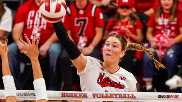 Nebraska Cornhuskers middle blocker Andi Jackson (15) attacks 