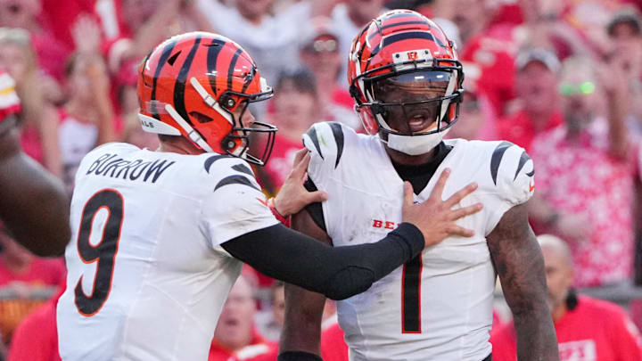 Sep 15, 2024; Kansas City, Missouri, USA; Cincinnati Bengals quarterback Joe Burrow (9) restrains wide receiver Ja'Marr Chase (1) after an altercation with officials during the second half of the game against the Kansas City Chiefs at GEHA Field at Arrowhead Stadium. Mandatory Credit: Denny Medley-Imagn Images