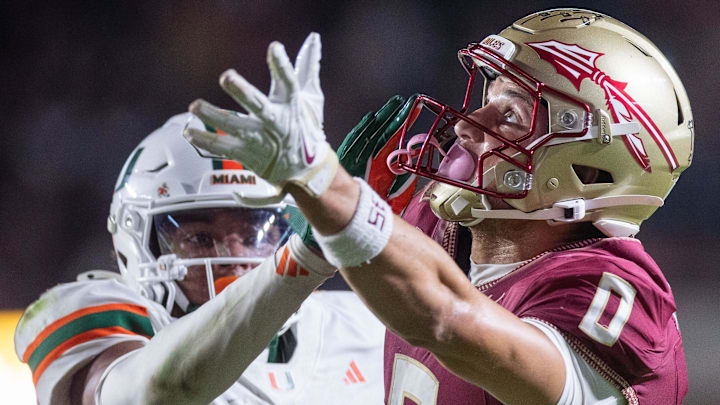 Florida State Seminoles wide receiver Duce Robinson (0) reaches for the ball in the end zone. The Miami Hurricanes defeated the Florida State Seminoles 22-28 at Doak Campbell Stadium on Saturday, Oct. 4, 2025.