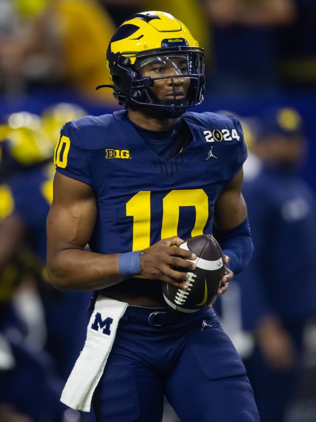 Michigan Wolverines football quarterback Alex Orji