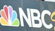 Jun 20, 2021; Nashville, Tennessee, USA; Country musician Brad Paisley on the NBC Sports set with former NASCAR Cup Series driver Dale Earnhardt Jr. before the Ally 400 at Nashville Superspeedway.